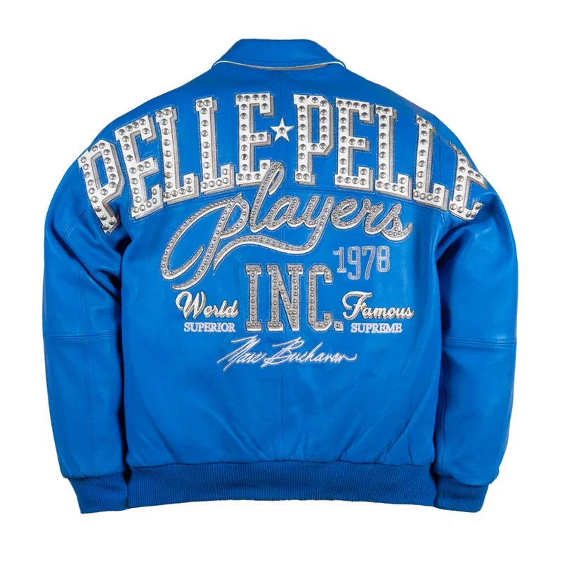 Back view of a royal blue and silver embroidered streetwear jacket displaying its rear design, structured sleeves, and ribbed hem on a white background.