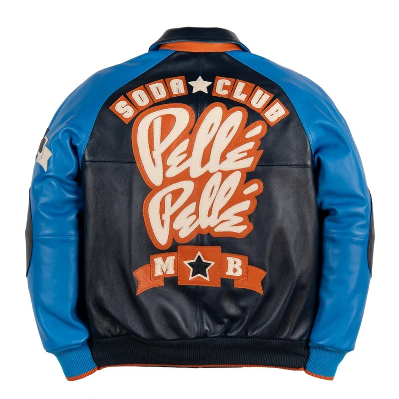 Back view of a black and blue varsity-style jacket featuring bold Soda Club lettering, orange and cream graphic details, and contrasting blue sleeves on a white background
